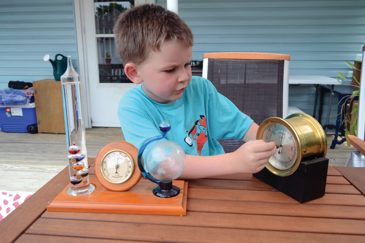 A STORM A’BREWIN: Duncan Robertson explains how his antique barometer measures air pressure and how it indicates a storm is imminent.